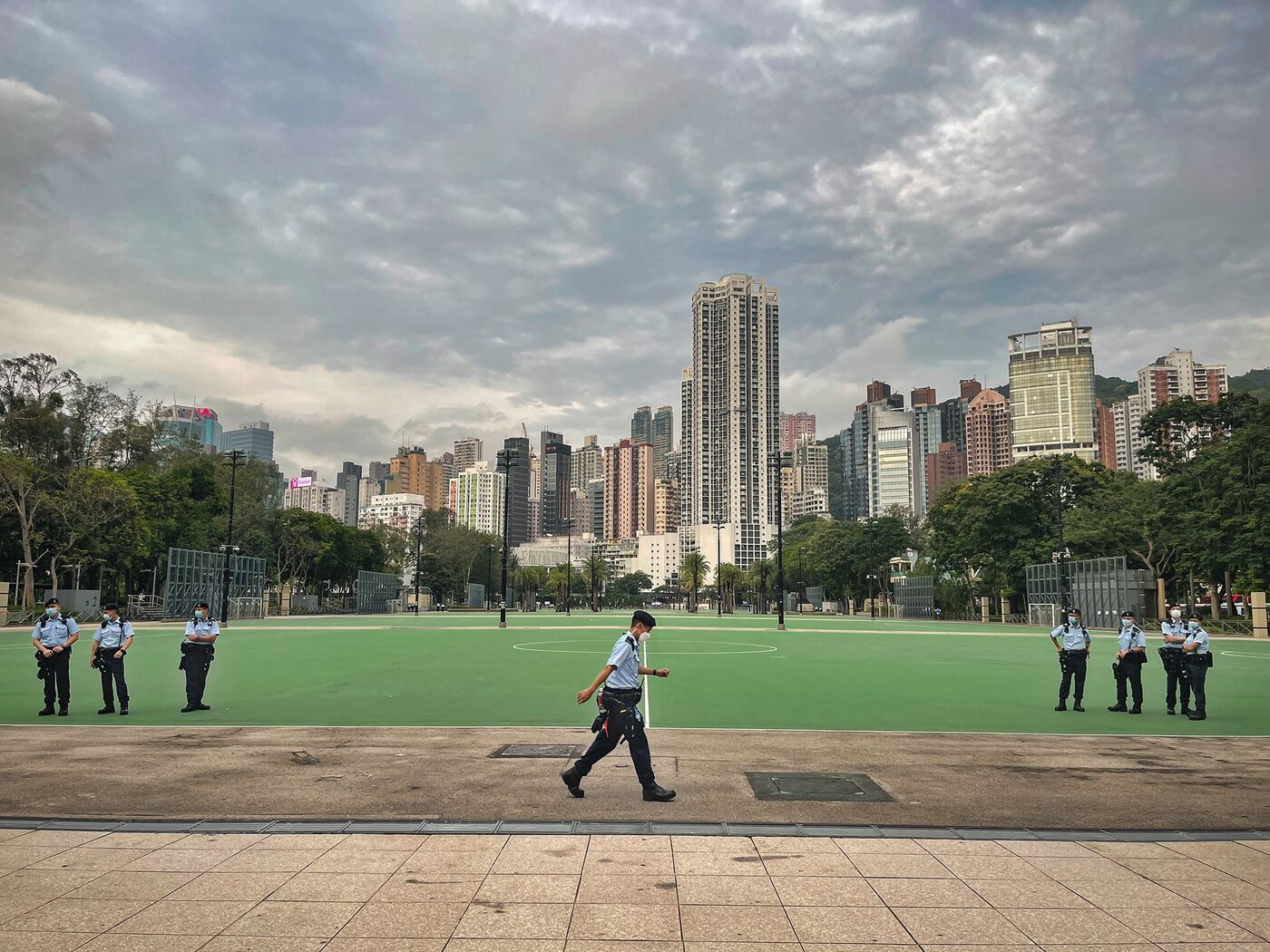 Riot police ring an empty, sealed-off Victoria Park on the June 4th anniversary, 2021