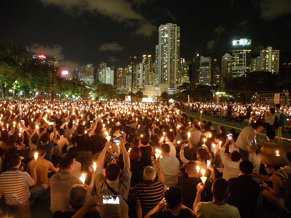 A sea of candles across the pitches at night, 2015