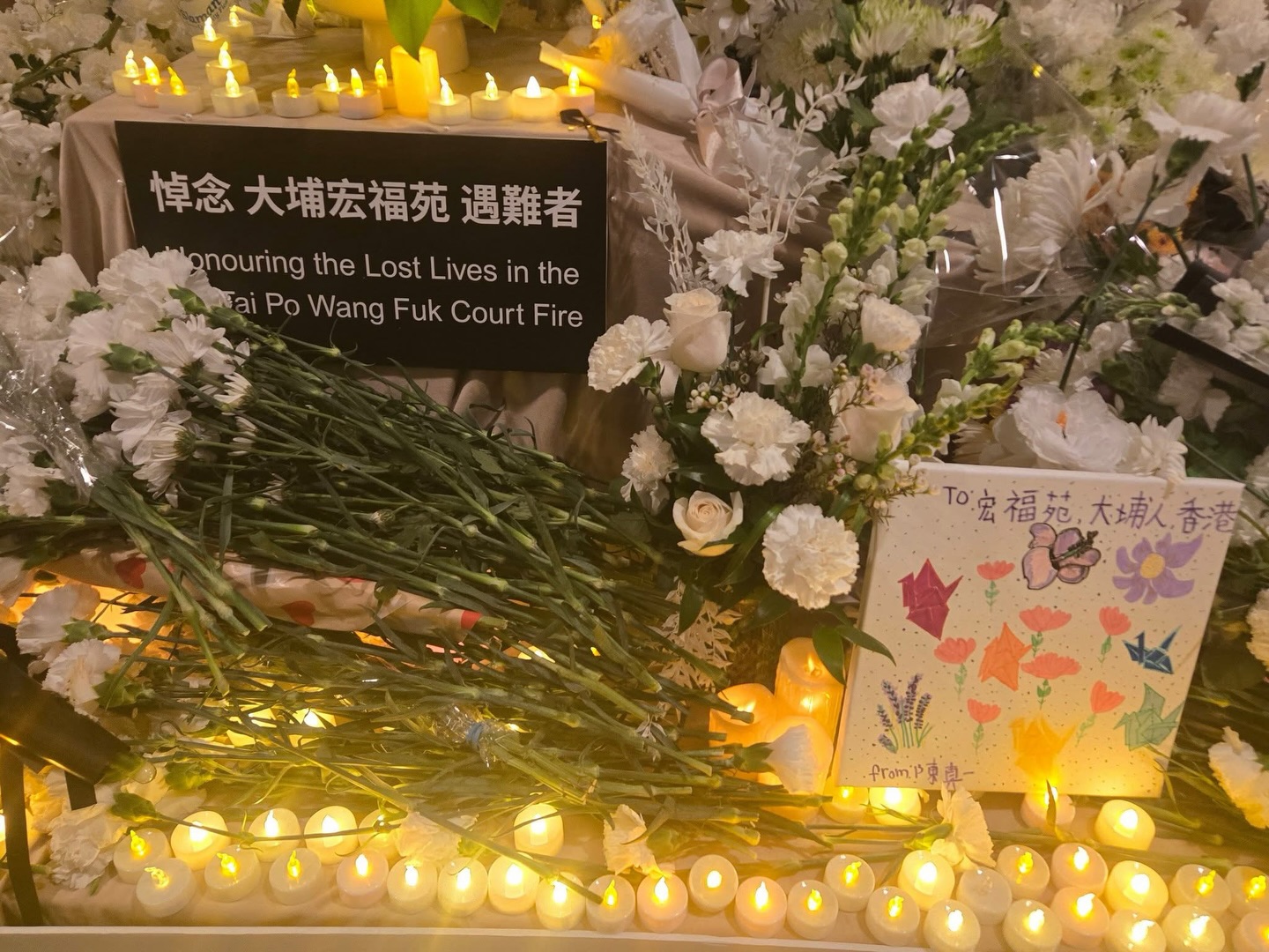 Toronto vigil honoring Wang Fuk Court victims